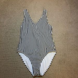 Black and white striped, one piece swimsuit.